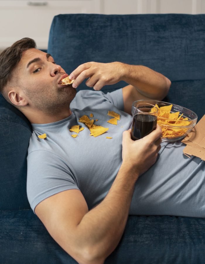 person-with-eating-disorder-trying-eat-fast-food